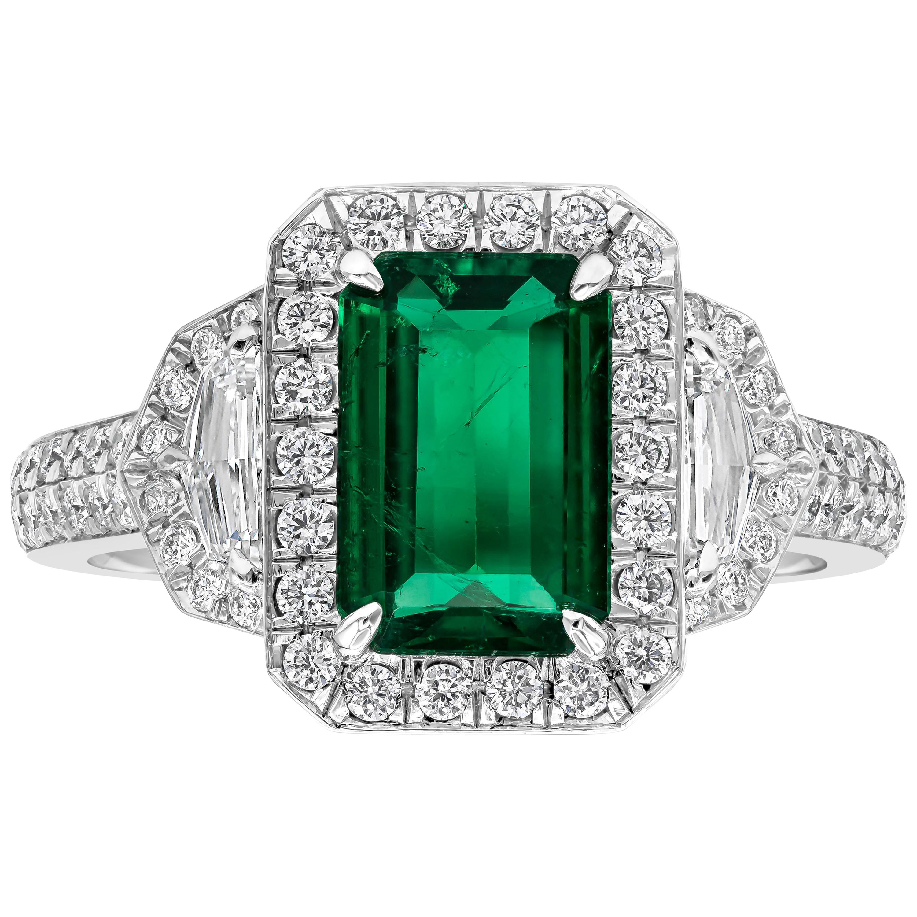 Colombian Emerald and Diamond Three-Stone Halo Diamond Ring