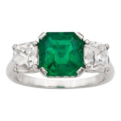 Vintage Emerald and Diamond Three-Stone Ring