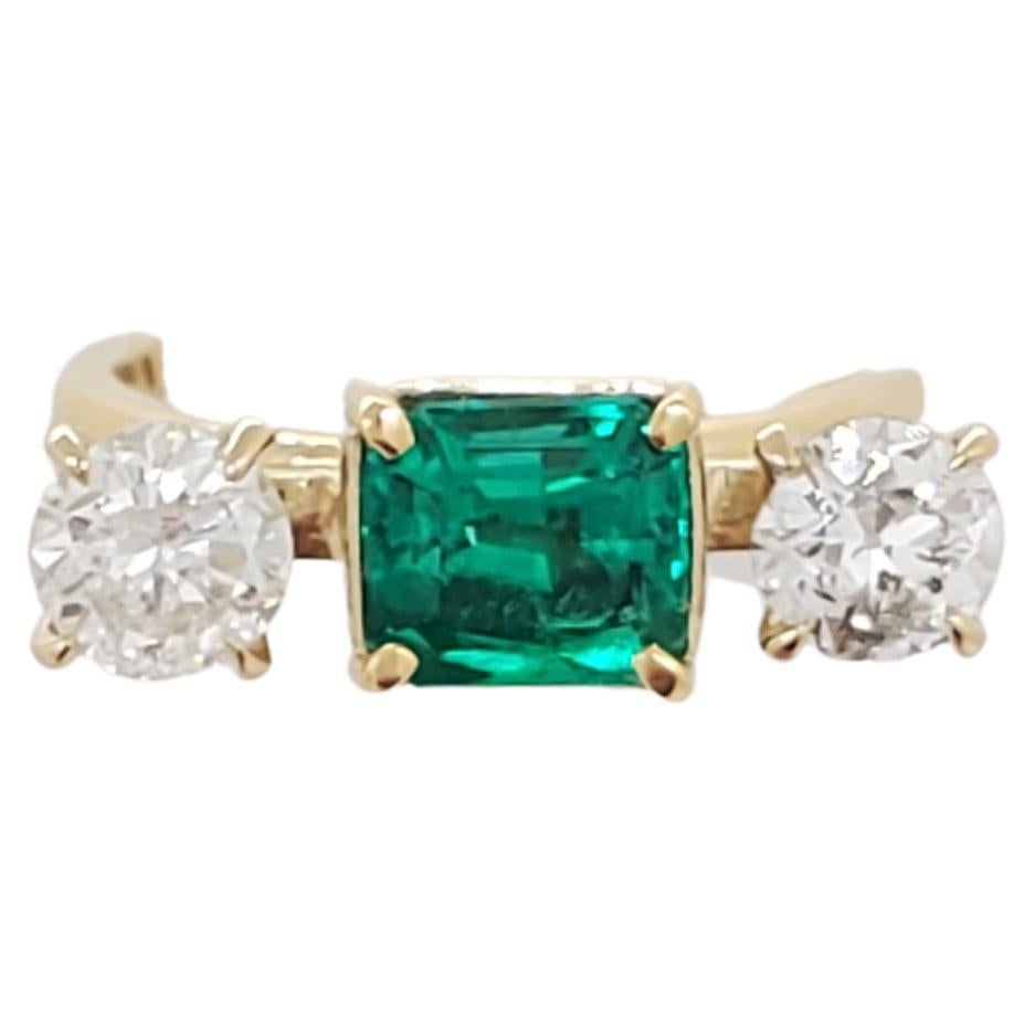Emerald and Diamond Three Stone Ring in 18k Yellow Gold
