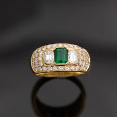 Emerald and Diamond Three-Stone Ring in 18K Yellow Gold, Italy
