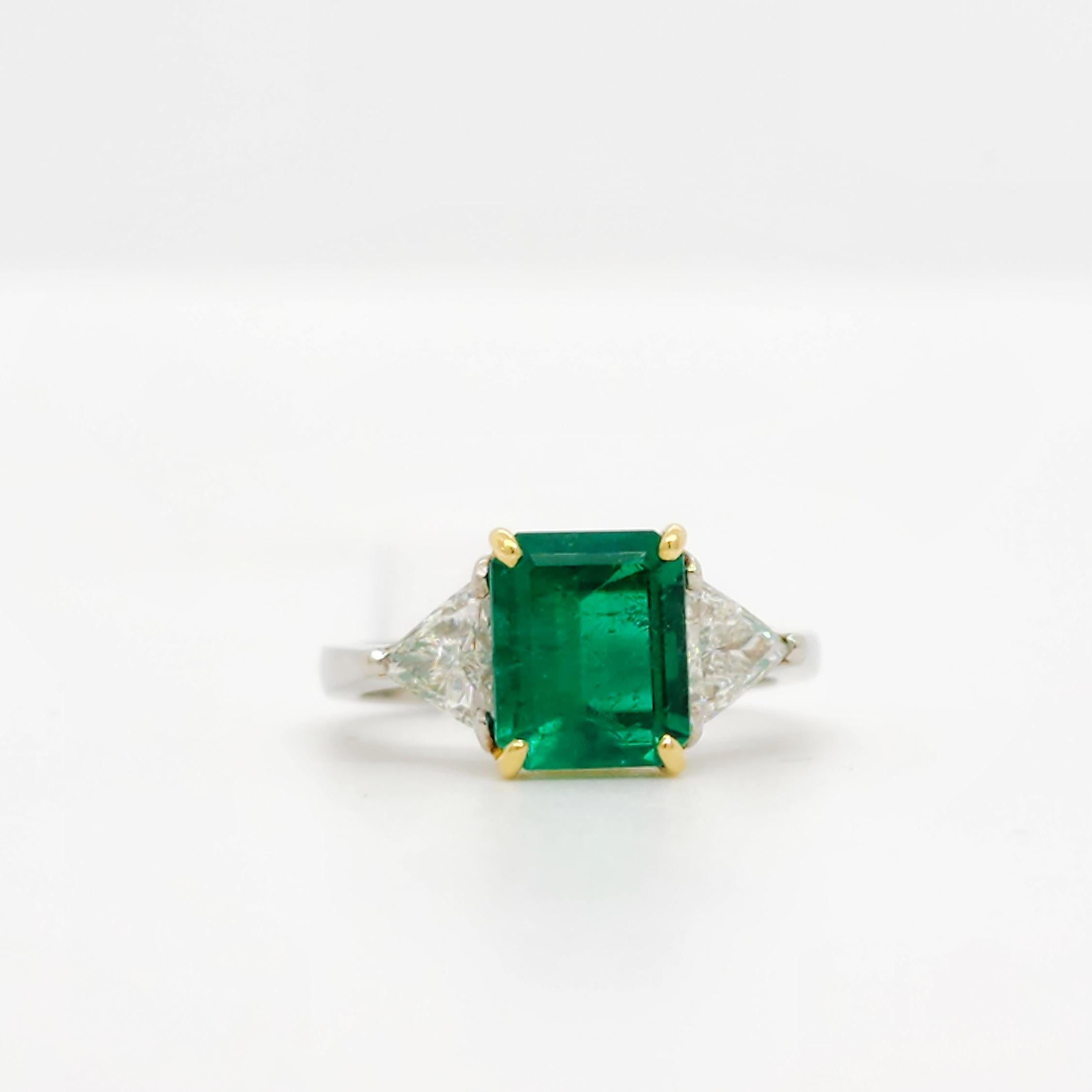 Emerald Cut Emerald and Diamond Three Stone Ring in Platinum and 18k Yellow Gold For Sale