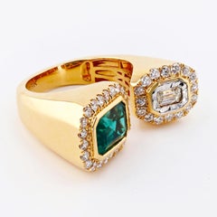 Bague à deux pierres en émeraude et diamant