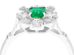 0.38ct Emerald & 0.54ct Diamond Cluster Ring in 18k White Gold