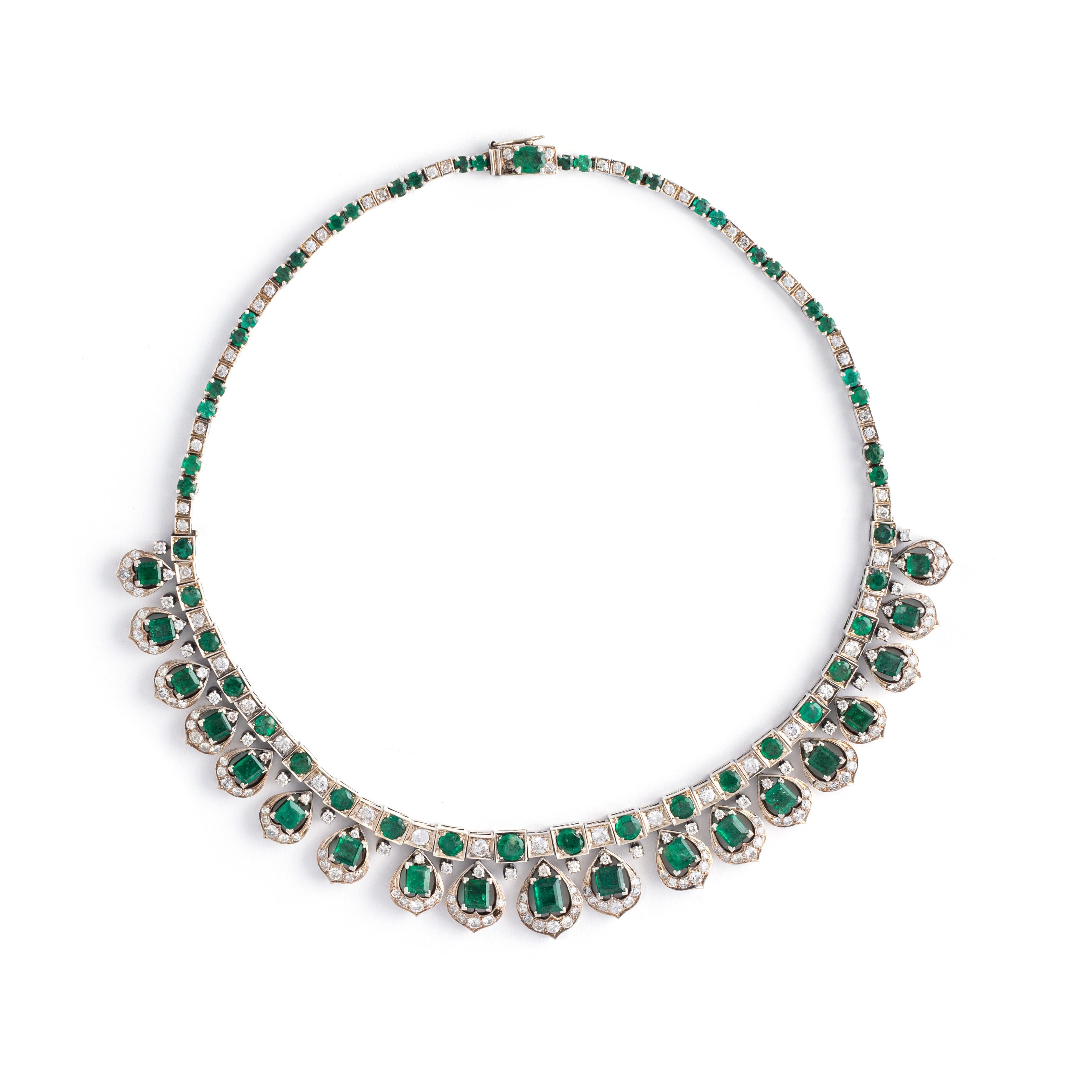 Emerald and Diamond White Gold Necklace

Total Emerald weight: estimated to be 14.14 carats
Total Diamond weight: estimated to be 7.80 carats
