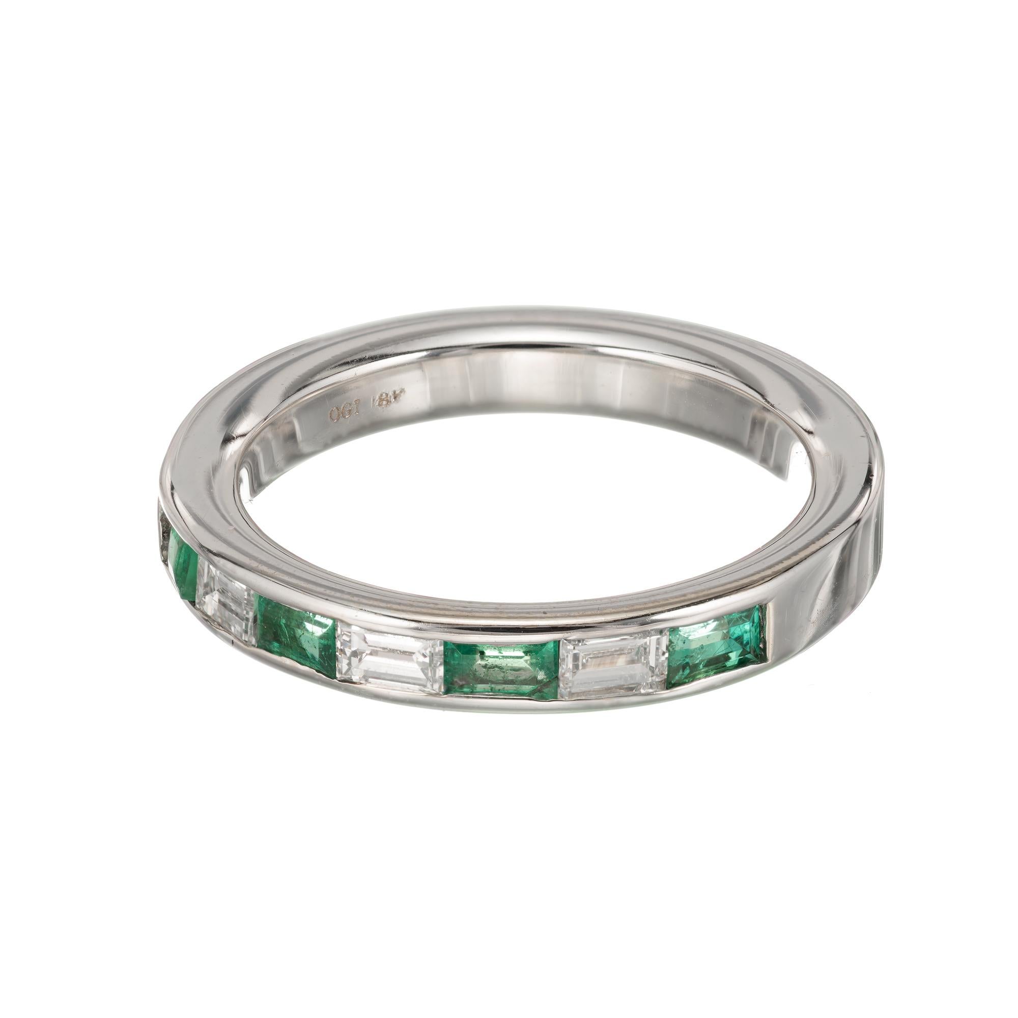  18k white gold wedding band setting with channel set Emeralds and diamonds.

3 baguette cut diamonds, approx. total weight .30cts, F, SI
4 baguette cut bright gem green Emeralds, approx. total weight .25cts, SI
Size 5 and sizable
18k white gold
4.2