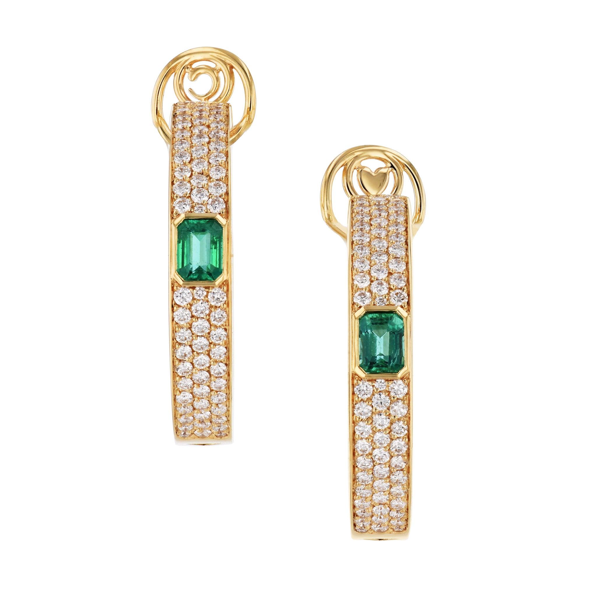 Awe-inspiring 18kt yellow gold hoop earrings, adorned with emeralds and diamonds.  
These earrings will take your breath away!
Emerald and Diamond Yellow Gold Hoop Earrings.

18kt. Yellow Gold. 
Hoop Earrings.
Emeralds: 1.89ct  total weight.