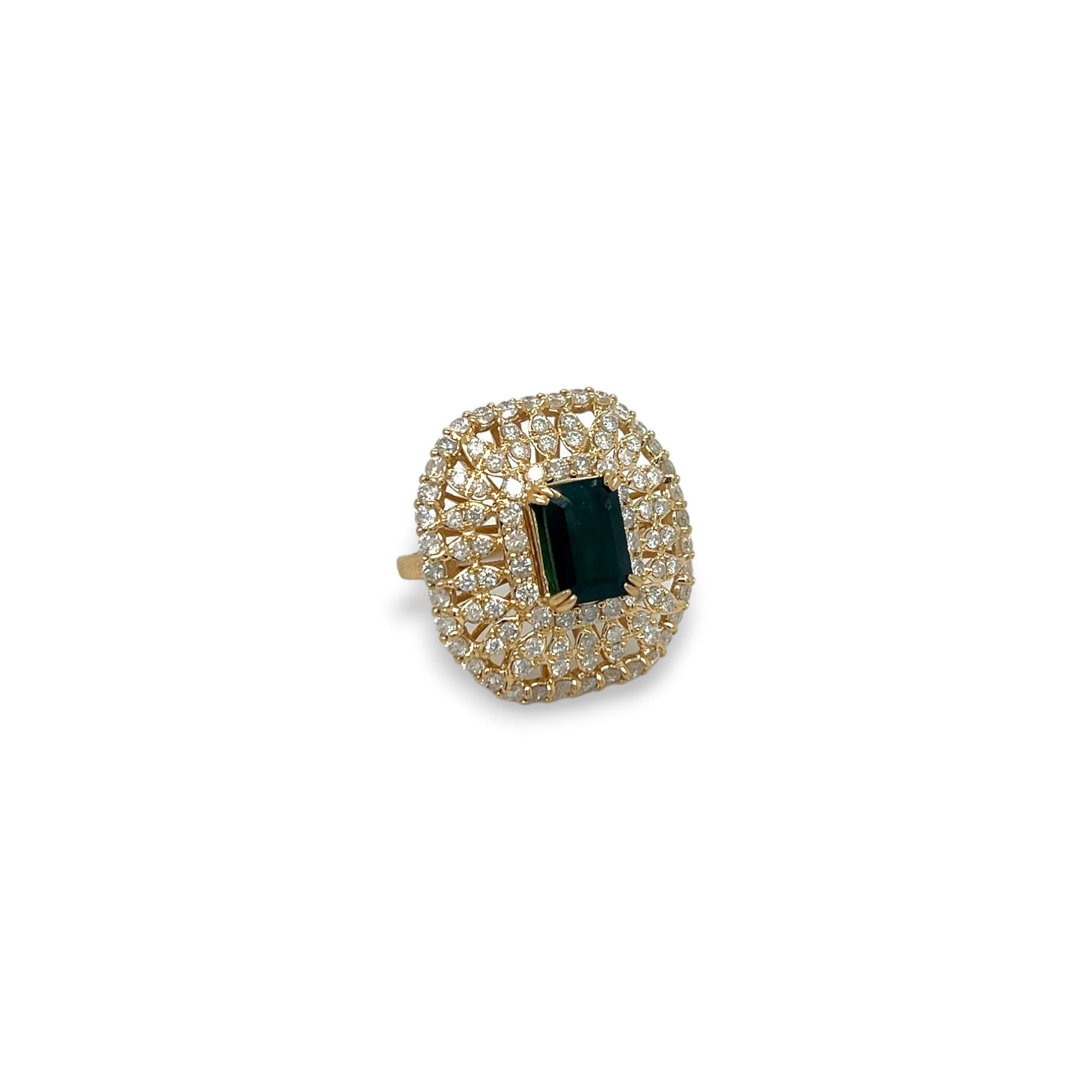 Add a touch of elegance to your wardrobe with this stunning cocktail ring. Crafted from 14k yellow gold, this ring features a beautiful 2.77 carat emerald-shaped emerald center stone. The emerald is complemented by the round-cut diamonds