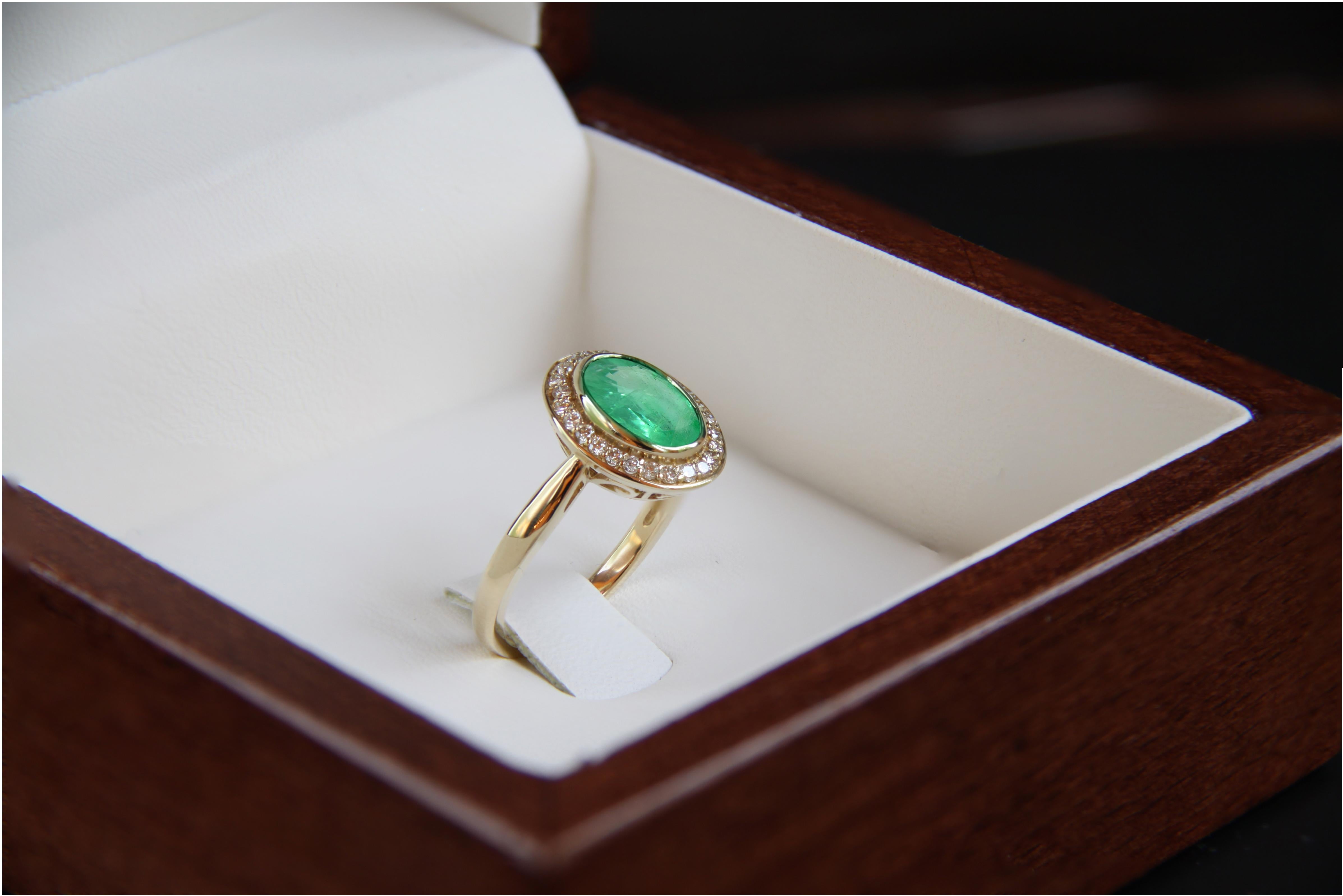 Oval Cut Emerald and diamonds 14k gold ring.  For Sale