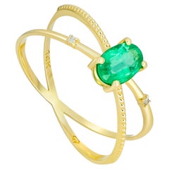Emerald and diamonds 14k gold ring