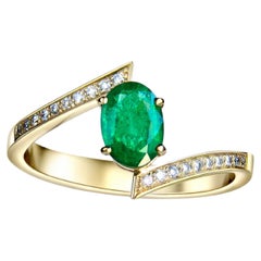 Emerald and diamonds 14k gold ring