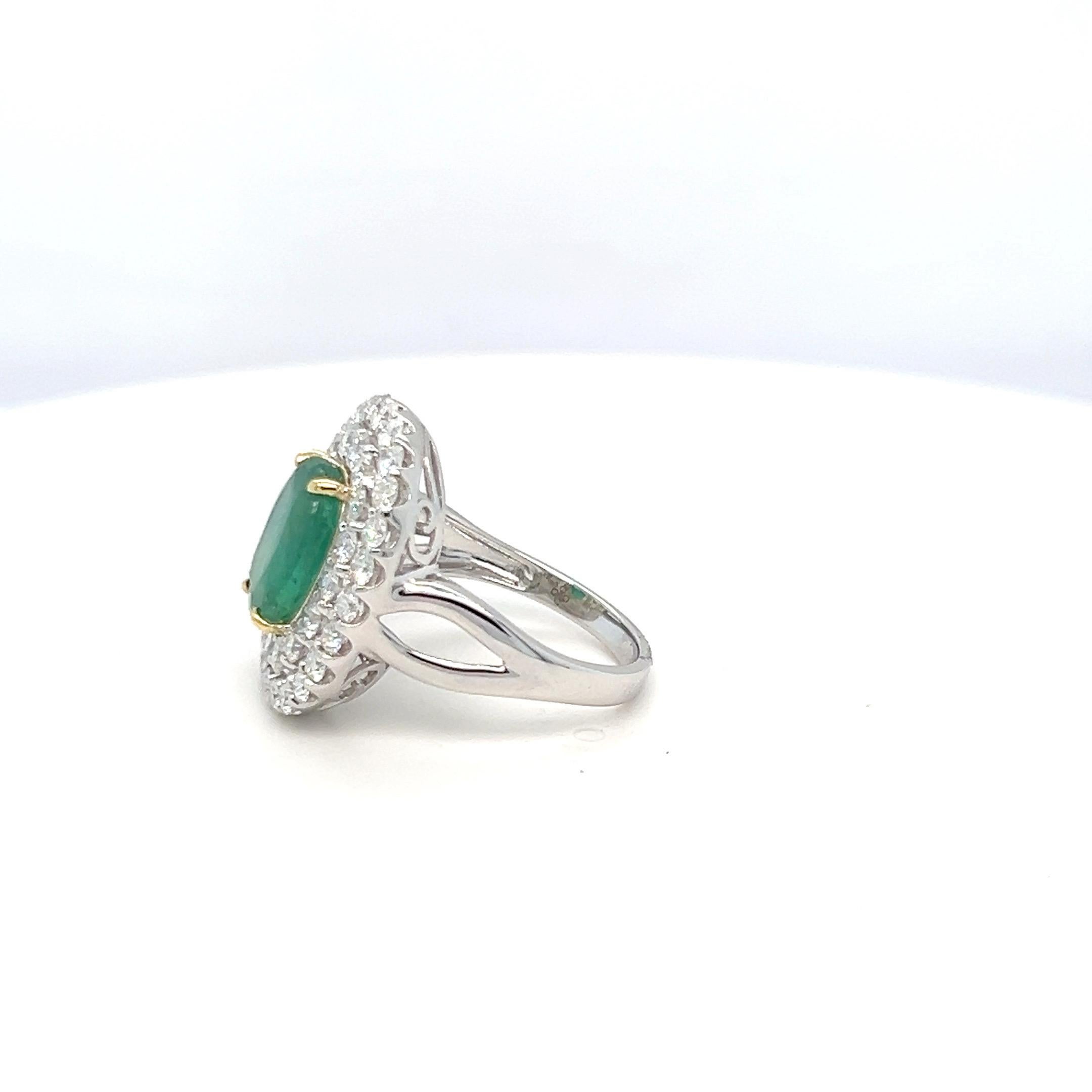 Artisan 1.65 Carat Oval Cut Emerald and Diamond Halo Ring For Sale