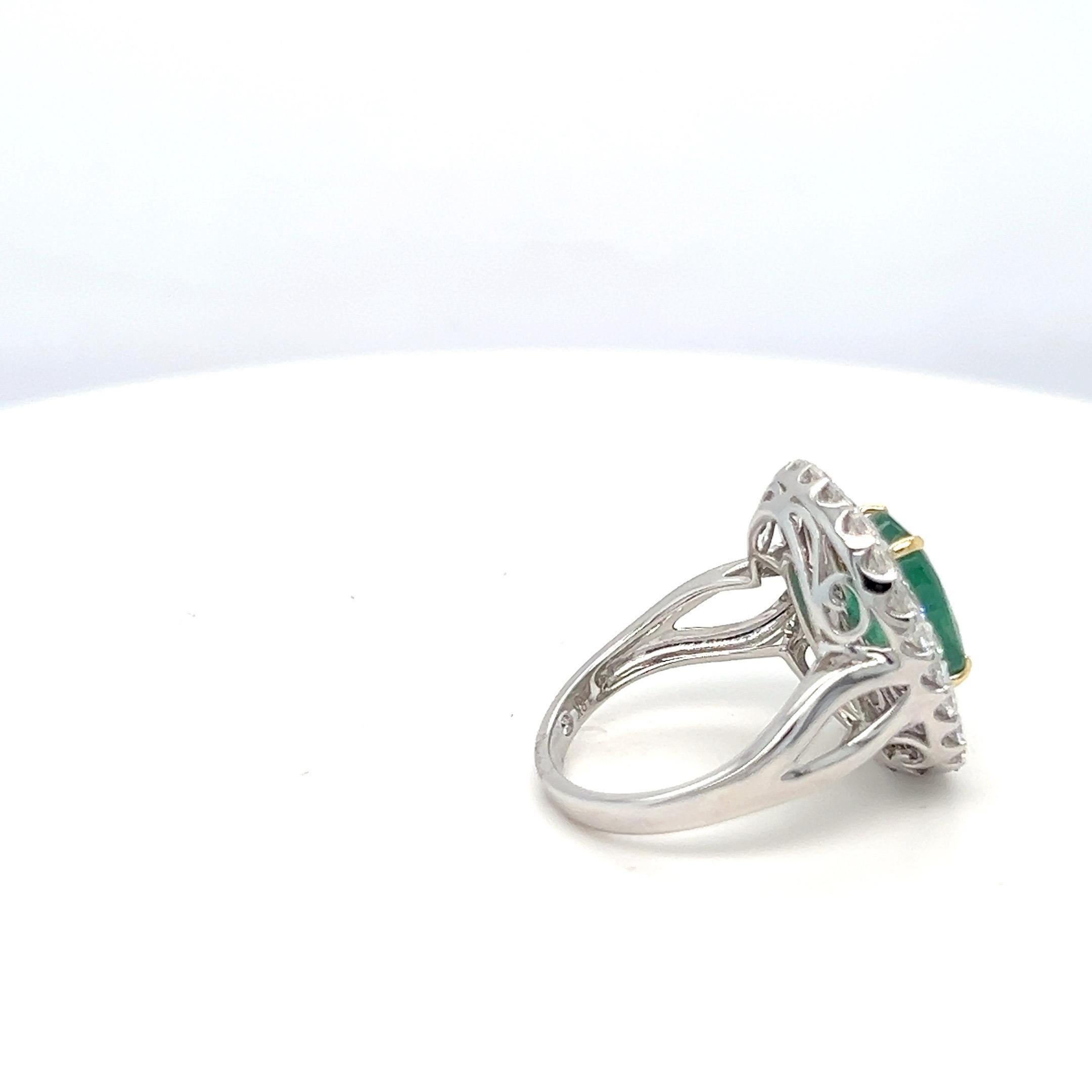 Women's 1.65 Carat Oval Cut Emerald and Diamond Halo Ring For Sale