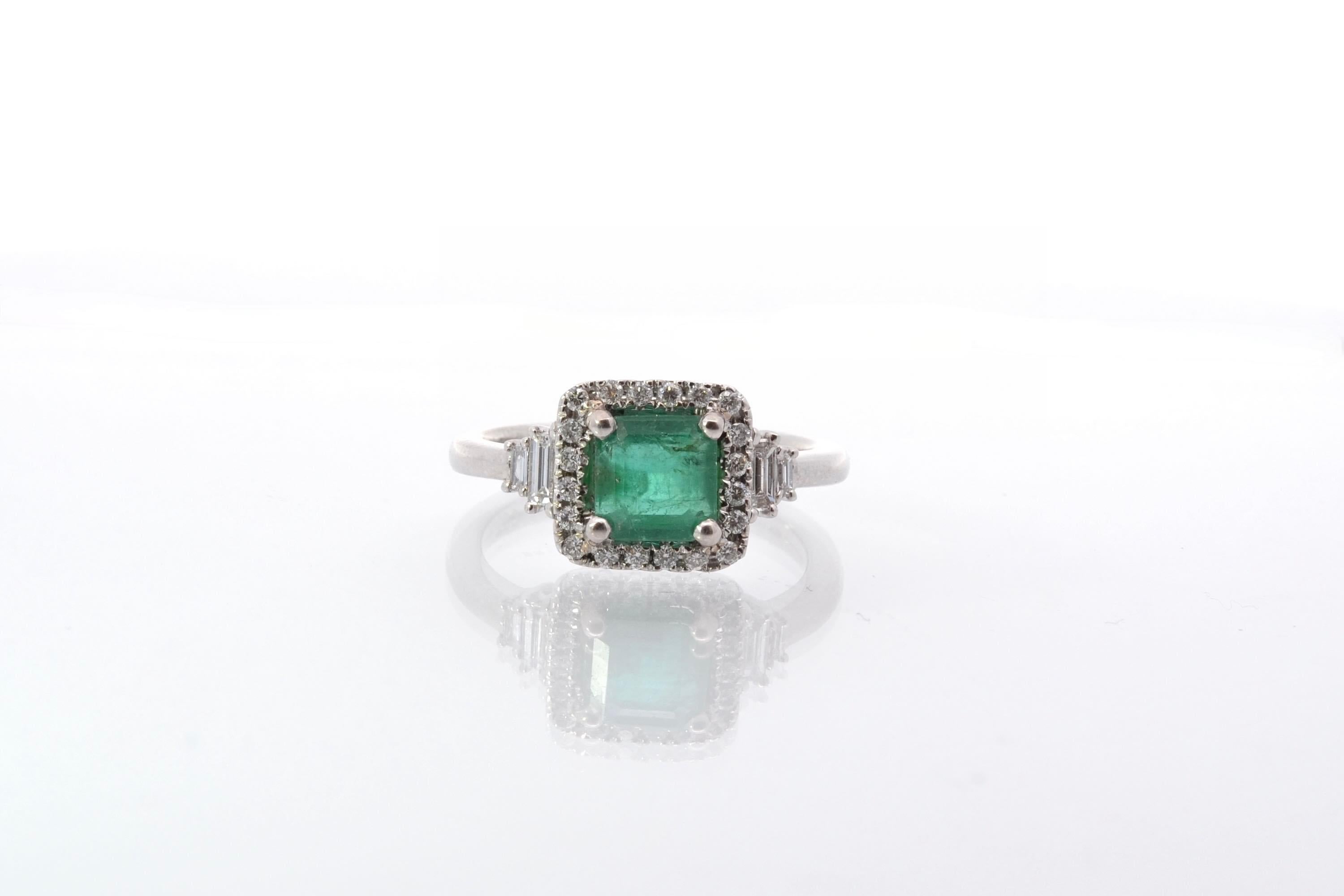 Stones: Emerald: 1.55 cts, 20 diamonds: 0.12 ct and 4 baguette diamonds: 0.20 ct
Material: 18k white gold
Dimensions: 1cm
Weight: 4.9g
Period: Recent vintage style
Size: 52 (free sizing)
Certificate
Ref. : 25574