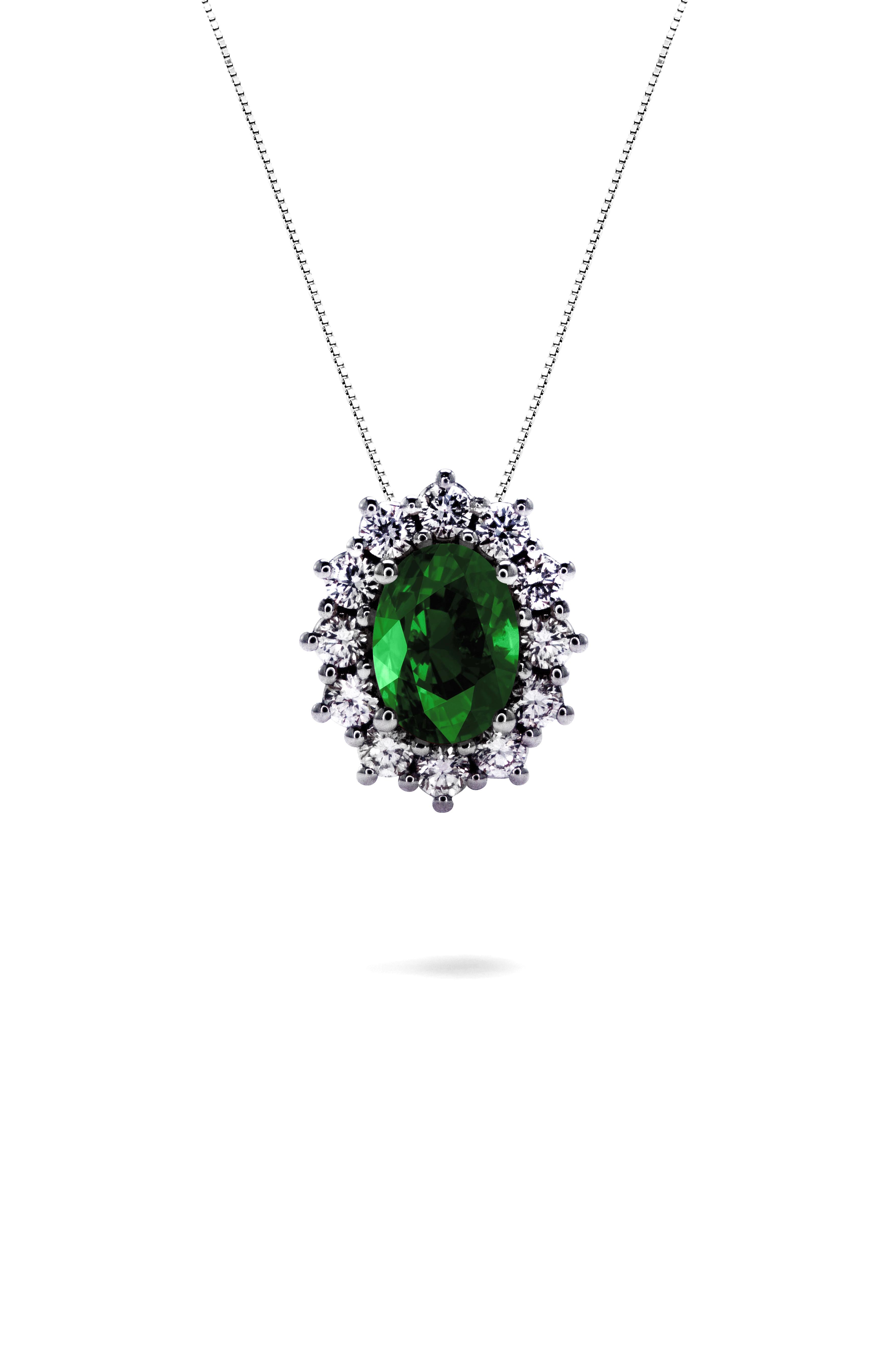 This Green Emerald and Diamond Sunflower pendant necklace, is set in 18Kt White Gold and from the Sunflower Chic collection. 

The Sunflower design to this pendant sets the 0.76 carat Emerald in the bud and surrounds it with 12 diamond petals