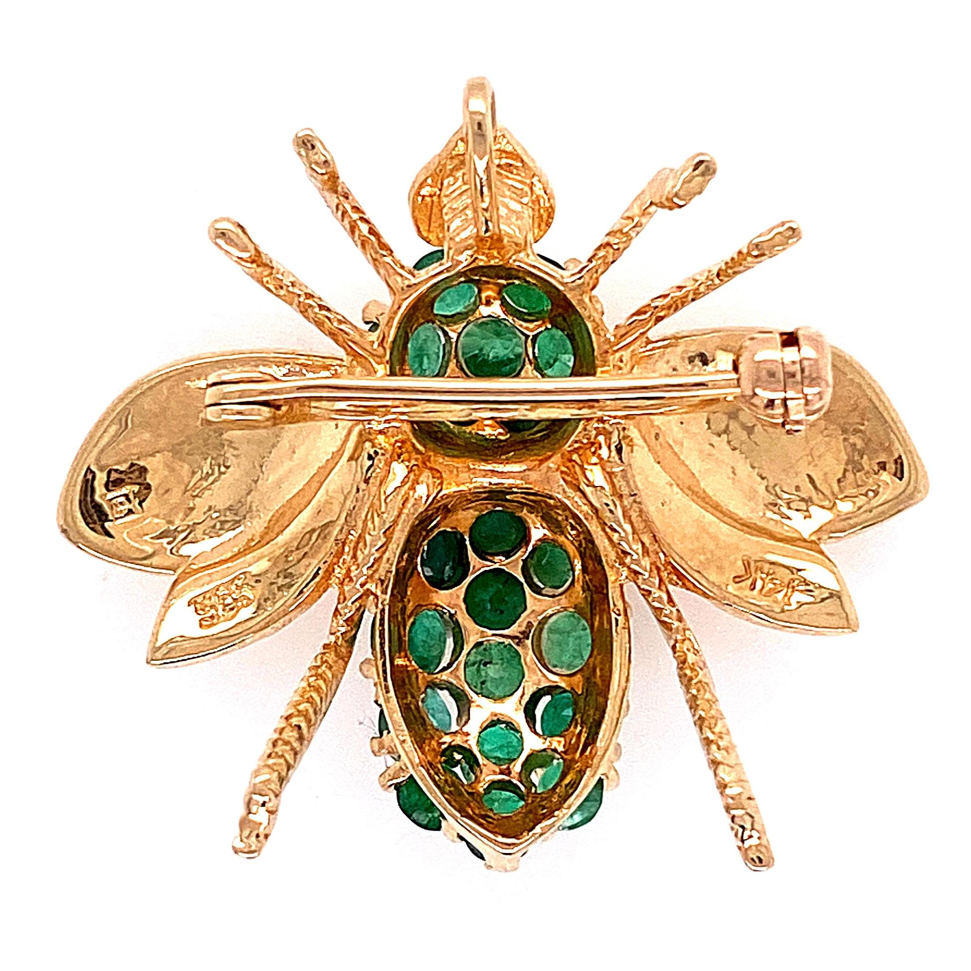 Simply Beautiful, Stylish and finely detailed Emerald Bee Brooch/Pendant. Hand crafted in 14 Karat yellow Gold  and hand set with Emeralds. The Pin is in excellent vintage condition and recently professionally cleaned and polished. Much more
