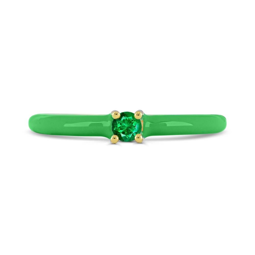 This elegant ring features one round-cut emerald prong sets between green enamel shank on top of a slim band sterling silver ring . 

Metal:  Sterling Silver
Gemstone:
Emerald: Round-Cut - 3.0mm.

This ring is available in ladies' size 6, 7,