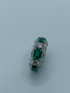 Anillo de Esmeralda y Diamantes Multiforma