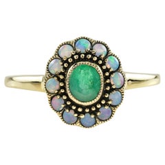 Emerald and Opal Vintage Style Floral Halo Ring in 9K Yellow Gold Emerald and Opal Vintage Style Floral Halo Ring in 9K Yellow Gold