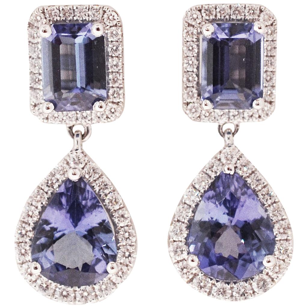 Emerald and Oval Shaped Tanzanite and Diamond Drop Earrings in 18 Karat Gold For Sale