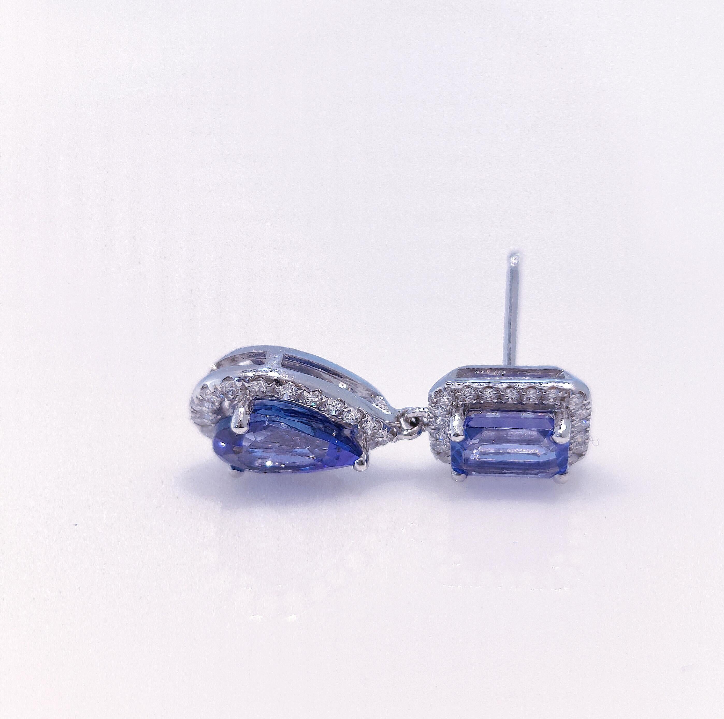 Emerald Cut Emerald and Oval Shaped Tanzanite and Diamond Drop Earrings in 18 Karat Gold For Sale