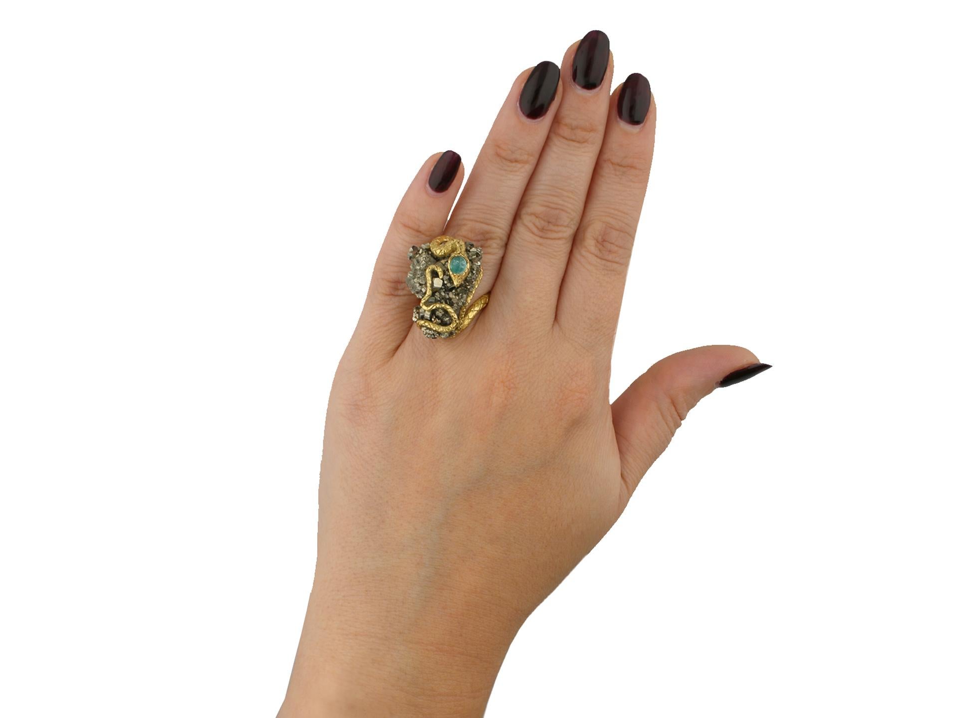 Emerald and pyrite snake ring, French, circa 1960. For Sale 1