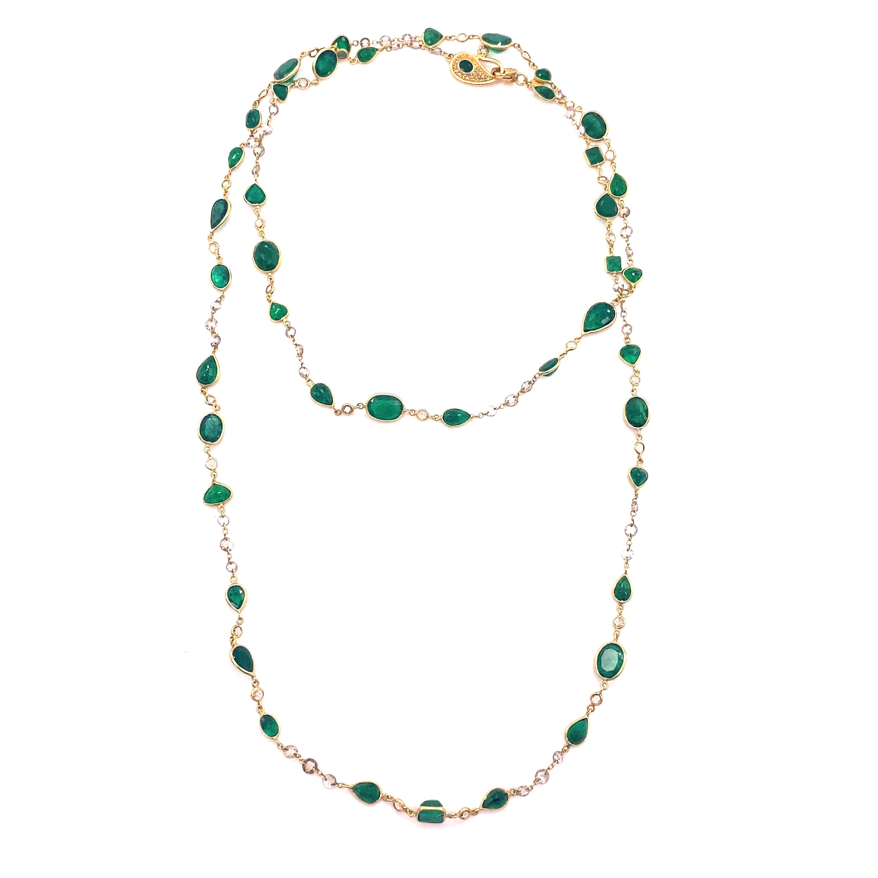 20 Karat Yellow Gold Emerald and Rose-Cut Diamonds Necklace with 32.47 Carat Emeralds and 6.02 Carat Diamonds. This Necklace Comes With A Small Clasp And Measures 36 Inches In Length.