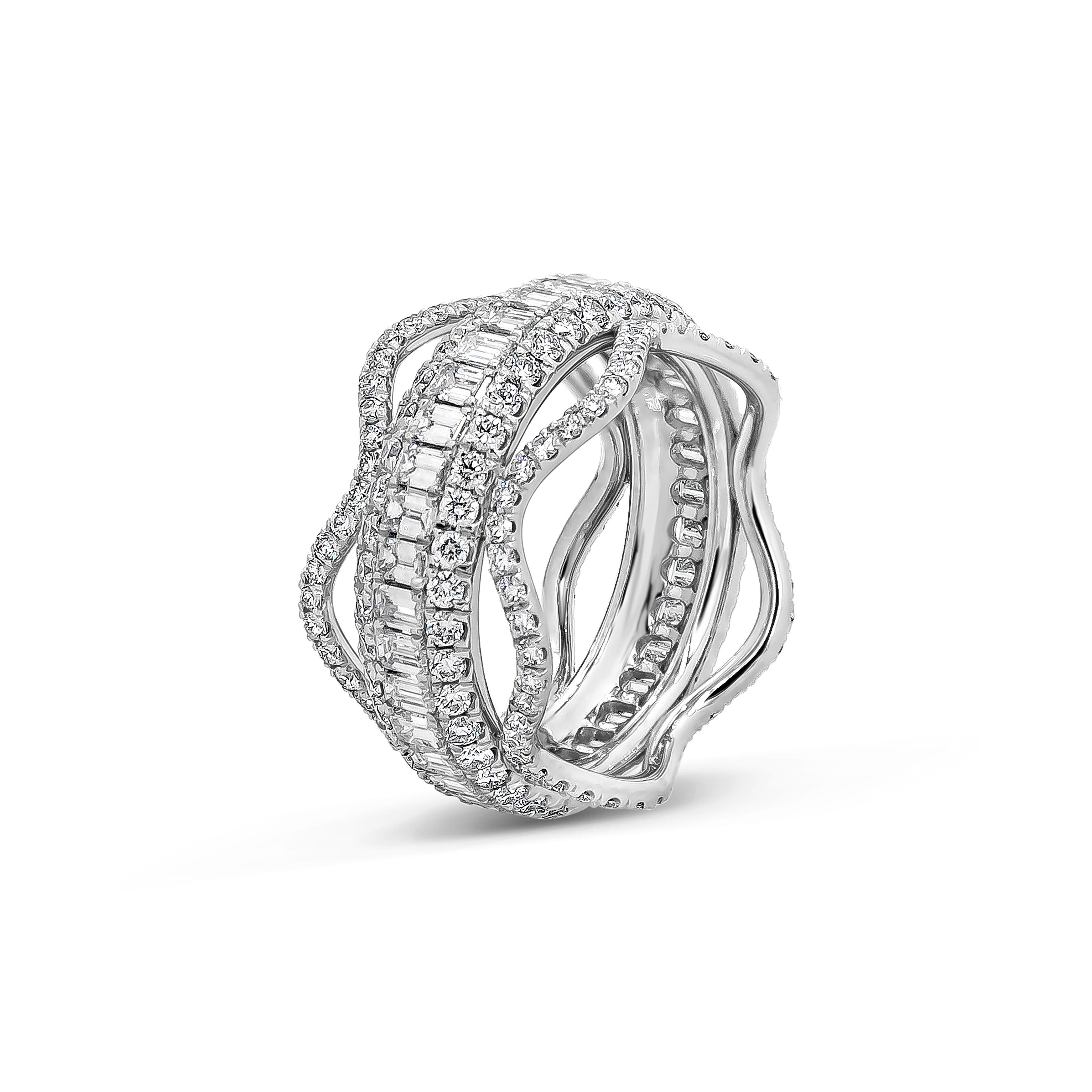 A unique fashion ring, showcasing one row of emerald cut diamonds, set in between two rows of round brilliant cut diamonds. Accented by round cut diamonds, set on a wave on both sides of the ring. Diamonds weigh 3.58 carats total. Finely made with a
