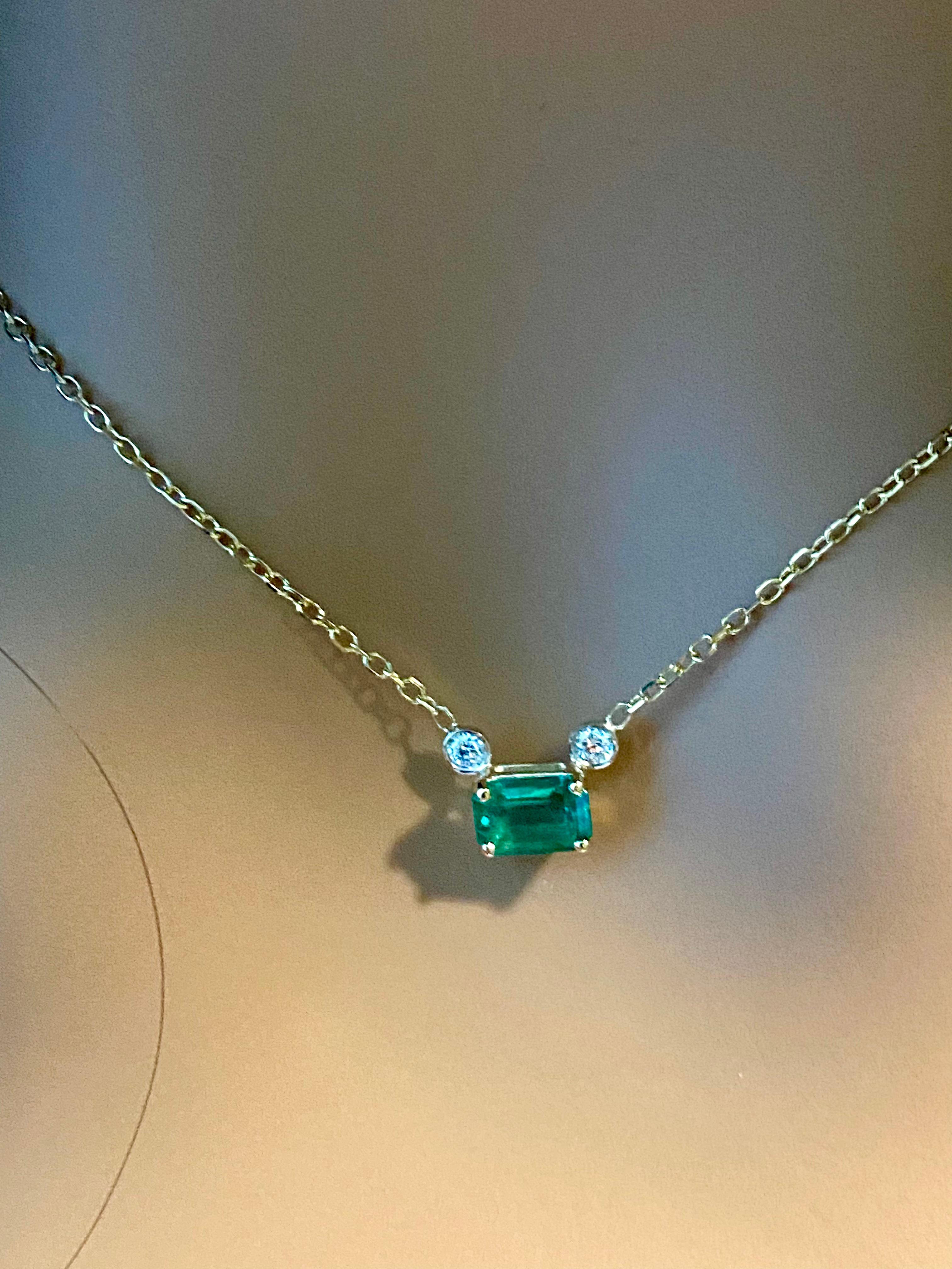 Contemporary Emerald and Round Diamond Yellow Gold Drop Pendant Necklace For Sale