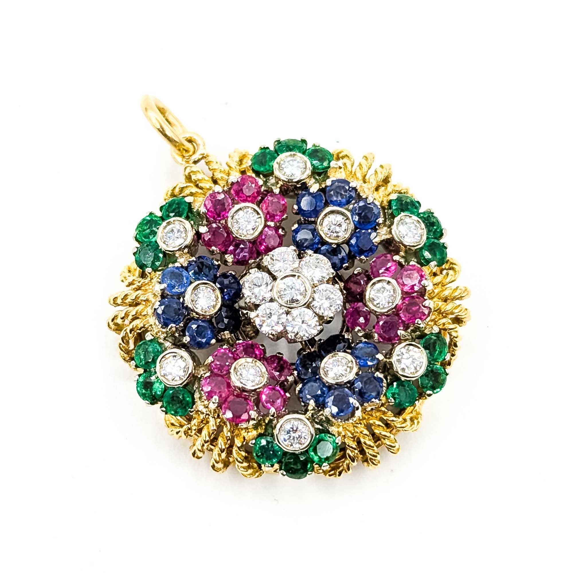 Emerald and Ruby Pendant in 18k Yellow Gold

Introducing this beautiful pendant crafted in 18k yellow gold, featuring a stunning combination of gemstones that captures the essence of timeless elegance. The centerpiece of this exquisite piece is a
