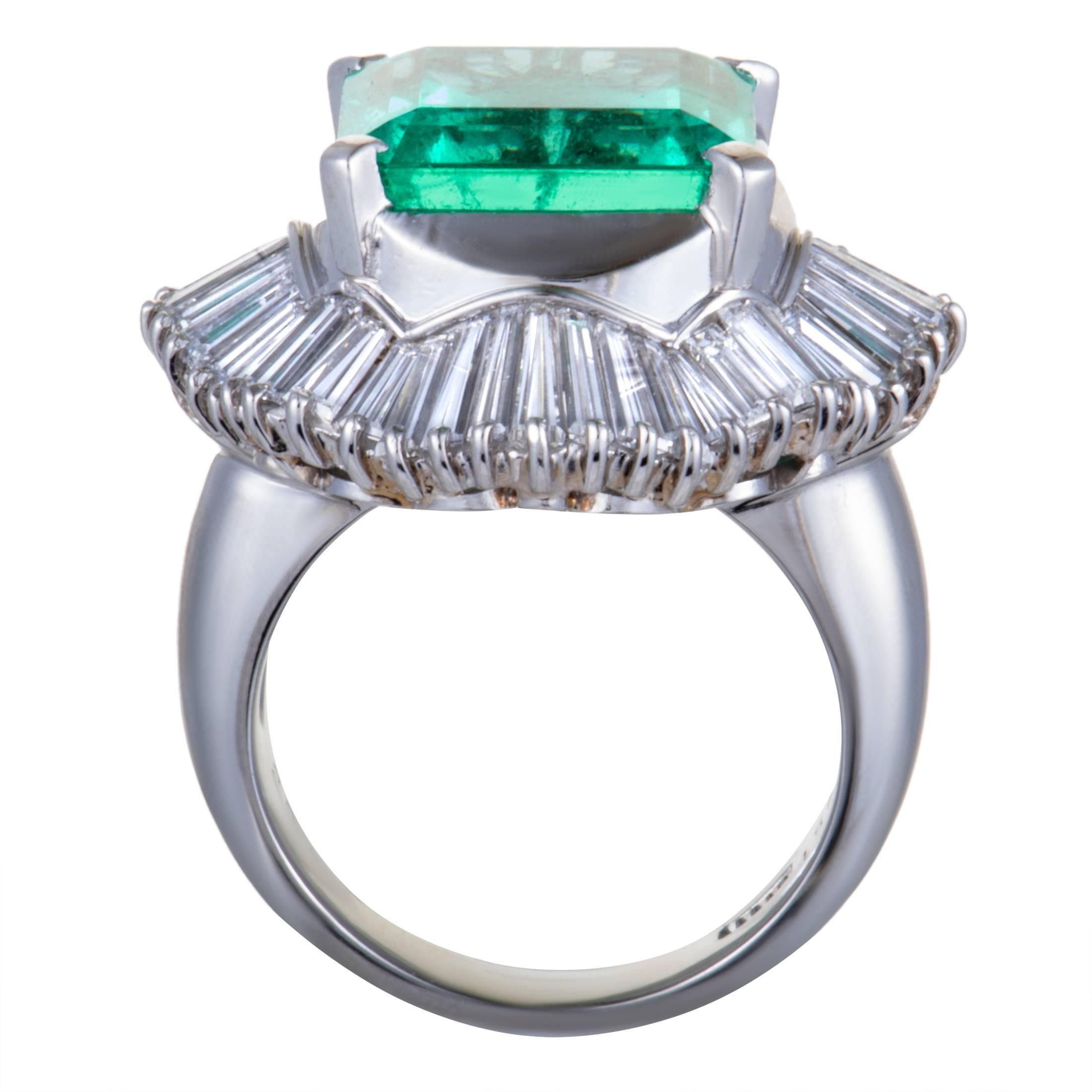 This mesmerizing ring features a classic design and compels with its luxurious décor. The fabulous ring is made of classy platinum and set with 2.93ct of sparkling diamonds around a captivating green emerald, weighing 7.51ct.
Ring Size: 5.75
Ring