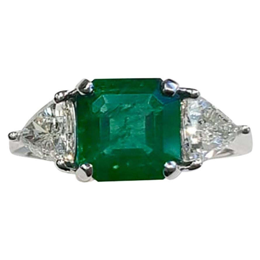 Emerald and Trillion Diamond 3-Stone Ring