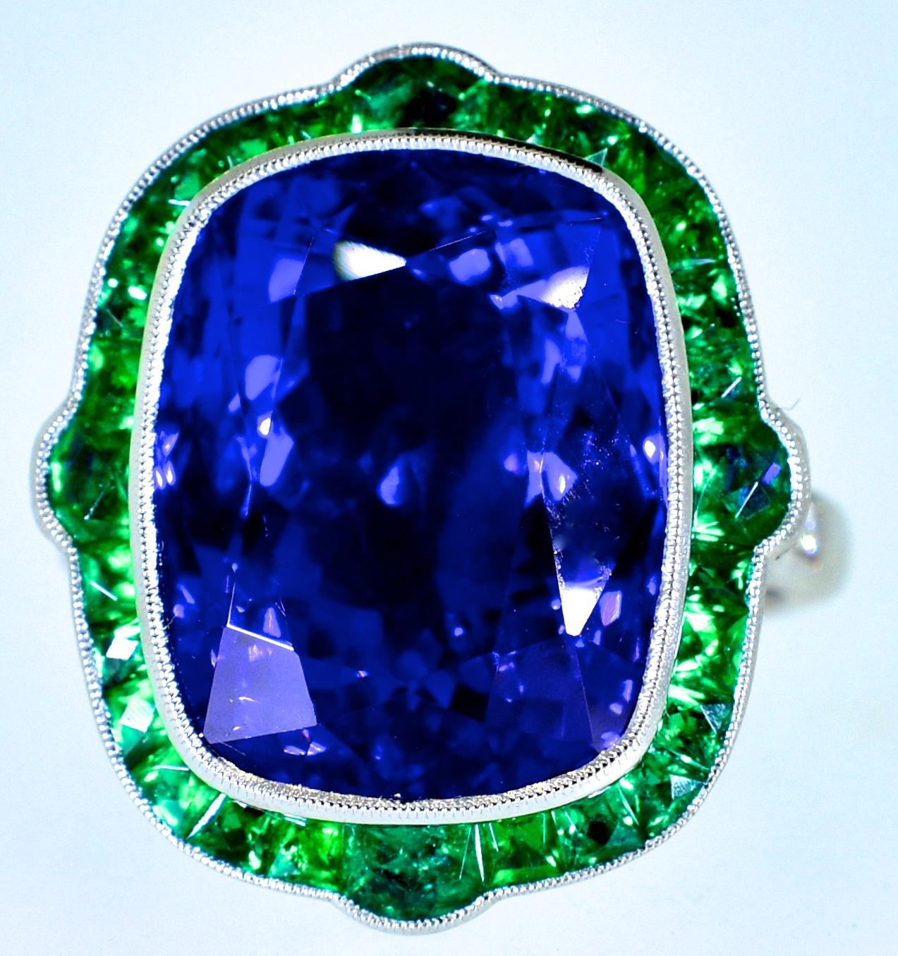 Contemporary  Very Fine Tanzanite and Emerald Platinum Ring
