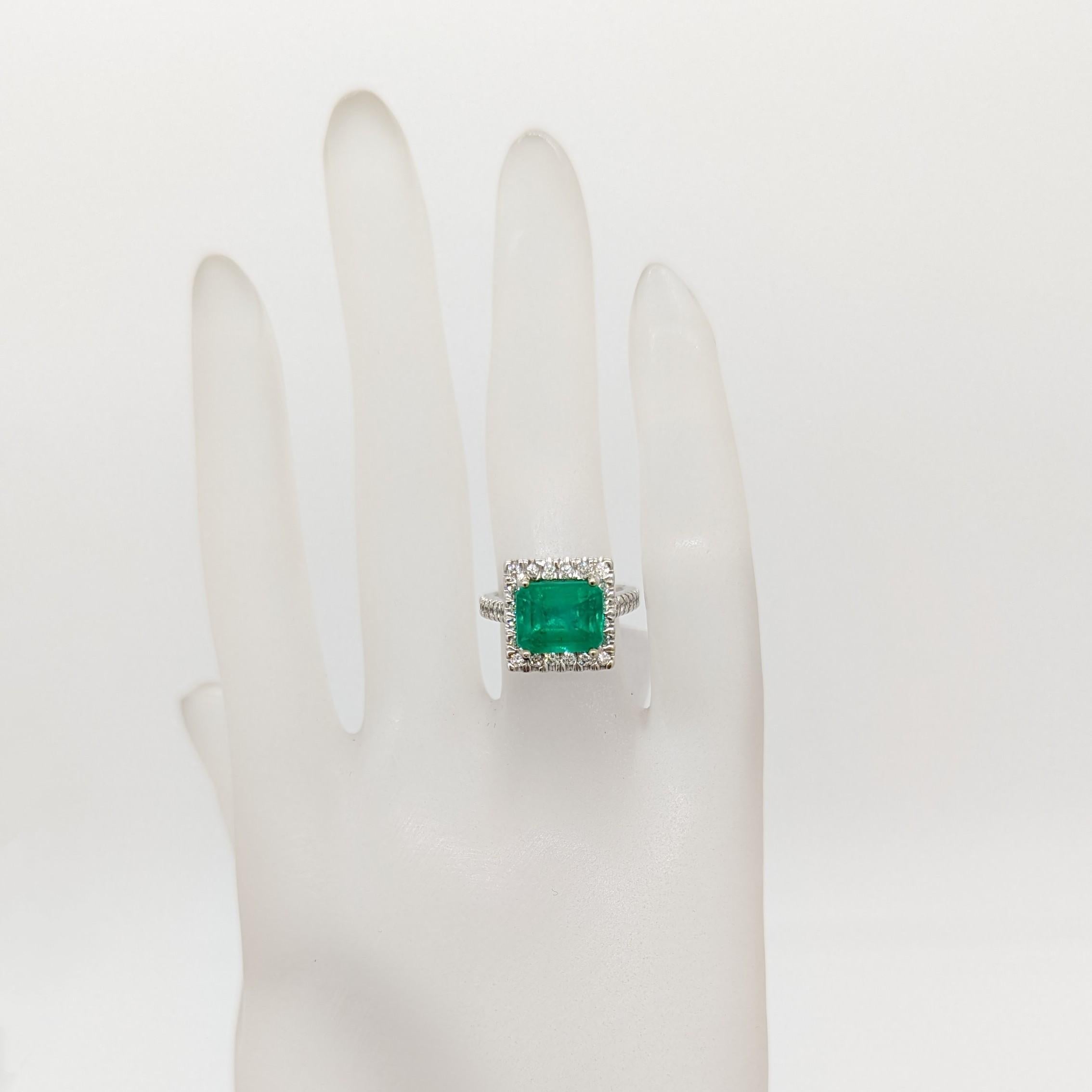 Beautiful 2.54 ct. emerald octagon with 0.45 ct. good quality white diamond round pave.  Handmade in 14k white gold.  Ring size 3.75.