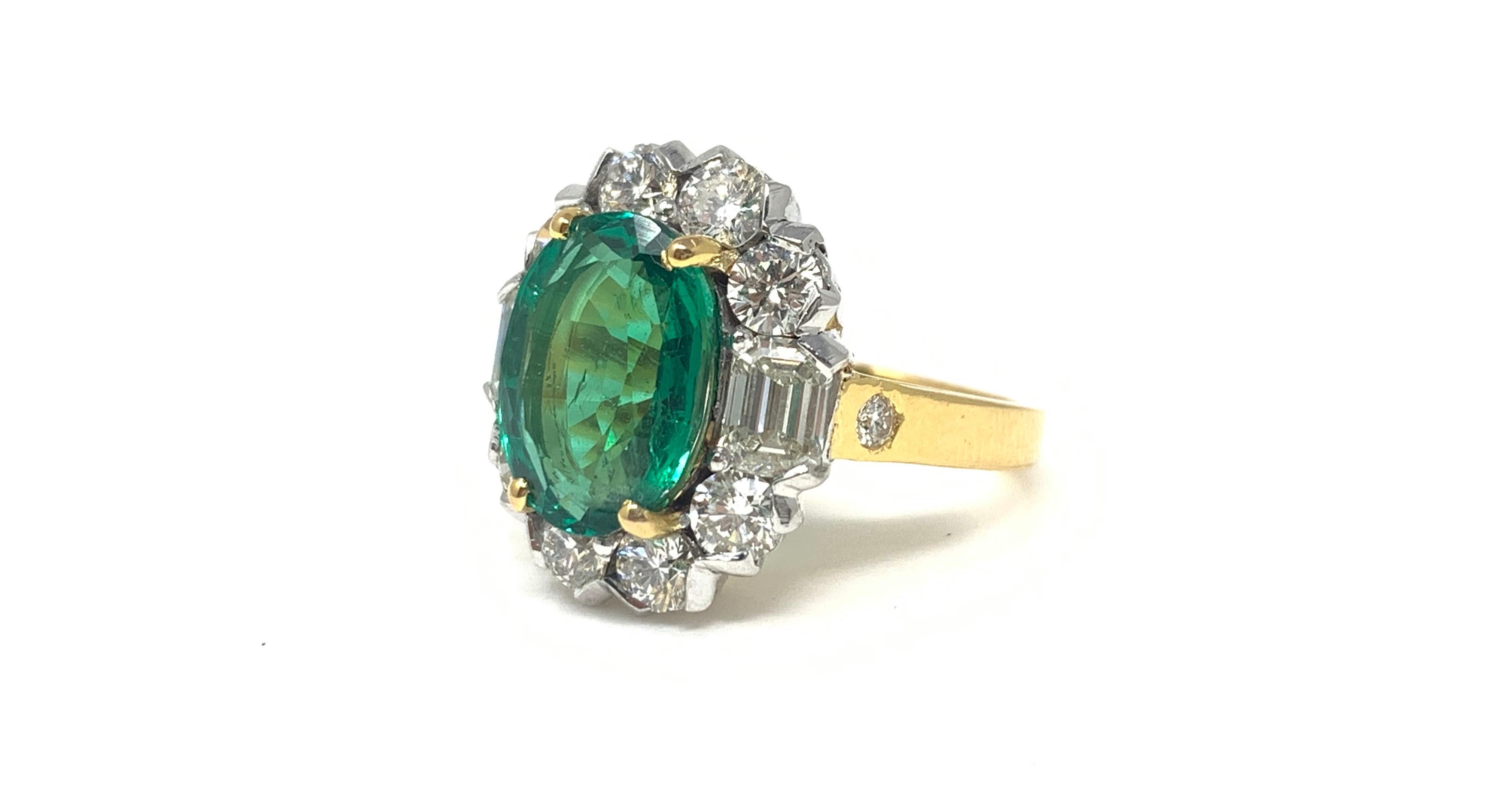 Moguldiam Inc's Emerald and Diamond Ring is handmade in 18k yellow gold. 

Emerald weight : 3.76 carat 
White diamond weight : 2.4 carat 
Metal : 18k yellow gold 
