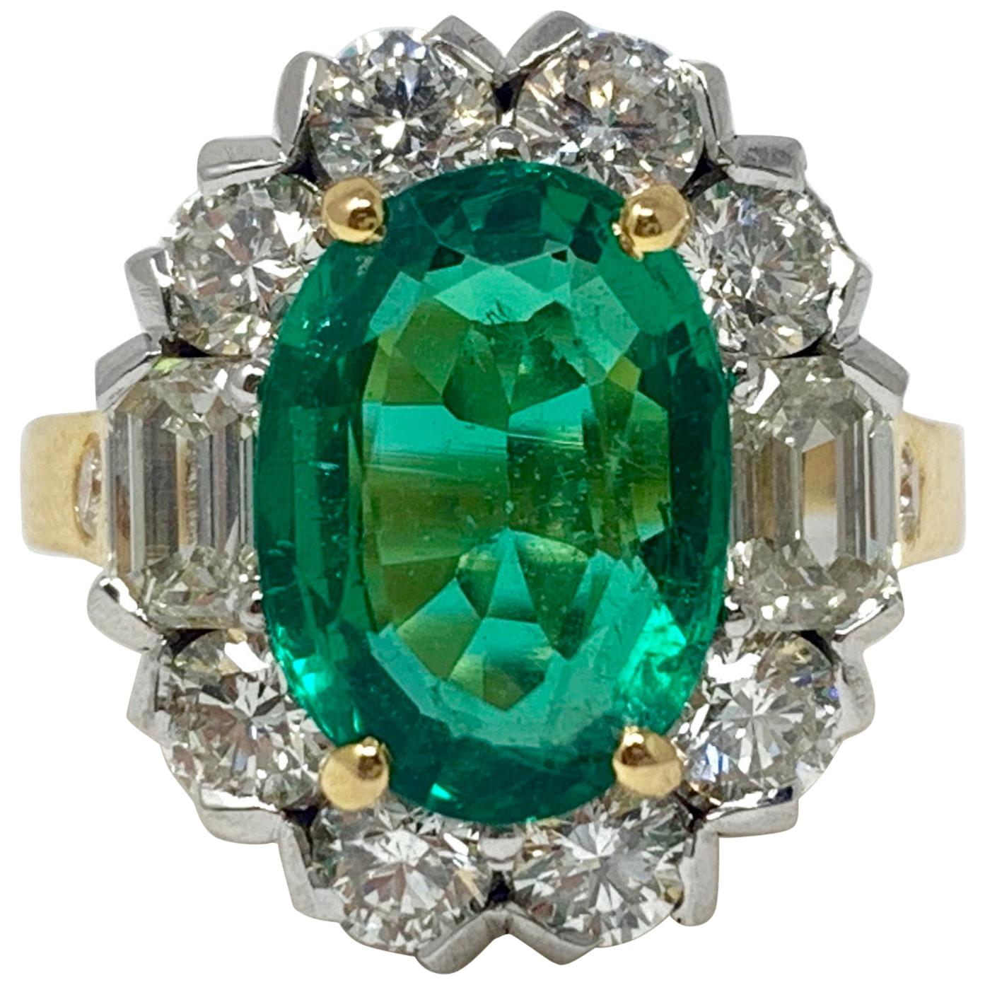 Emerald and White Diamond Engagement Ring in 18 Karat Yellow Gold