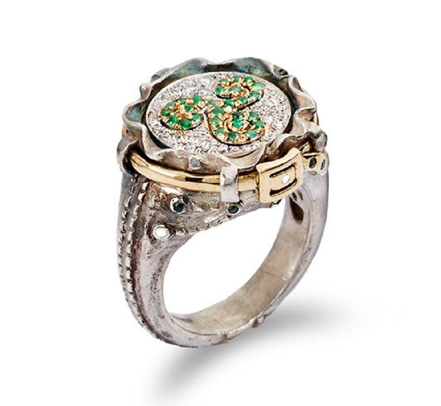 This Ancient Celtic symbolizes the trinity of Earth: Land, Sky & Sea. Show how you celebrate, honor and care for this amazing planet we call home. 

White Diamonds: .36cts

Emeralds: .17cts

Size small

Sterling & 18k yellow gold