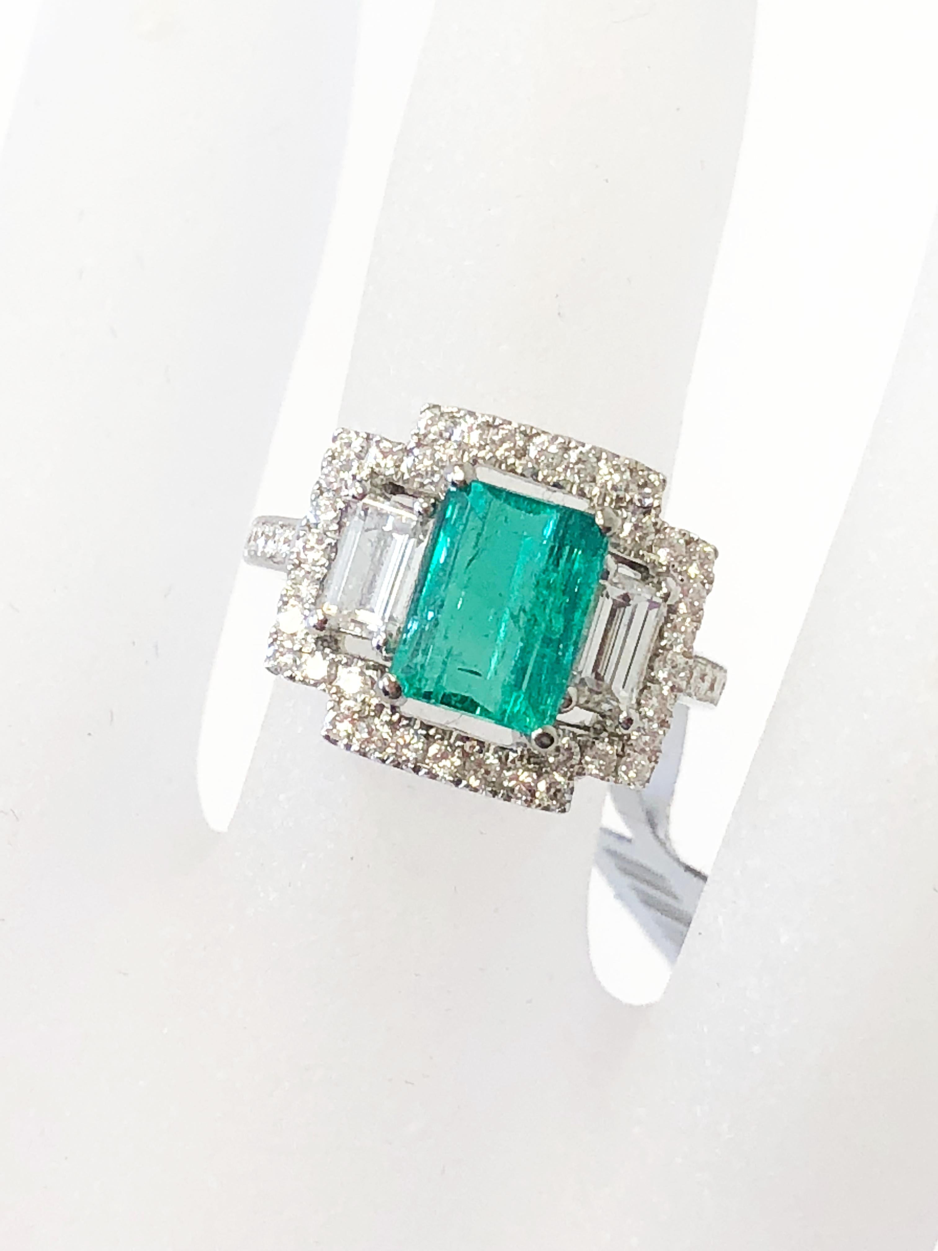 Emerald Cut Emerald and White Diamond Ring in 18 Karat White Gold