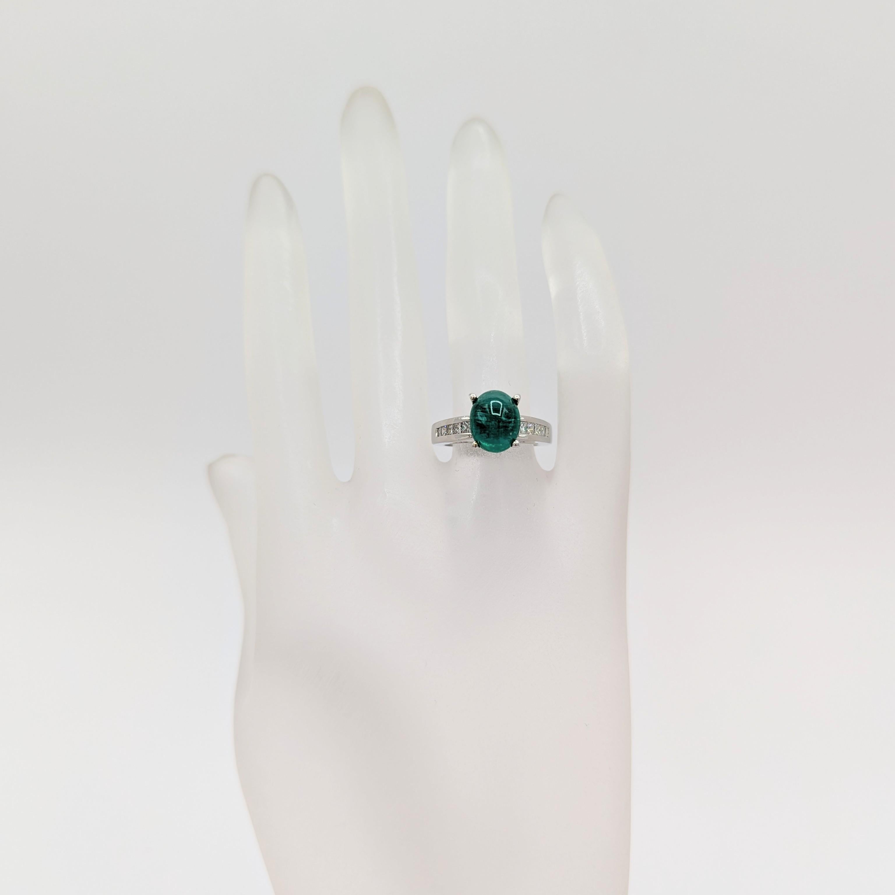 Oval Cut Emerald and White Diamond Ring in Platinum For Sale