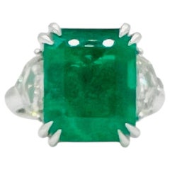 Emerald and White Diamond Three Stone Ring in 18K White Gold