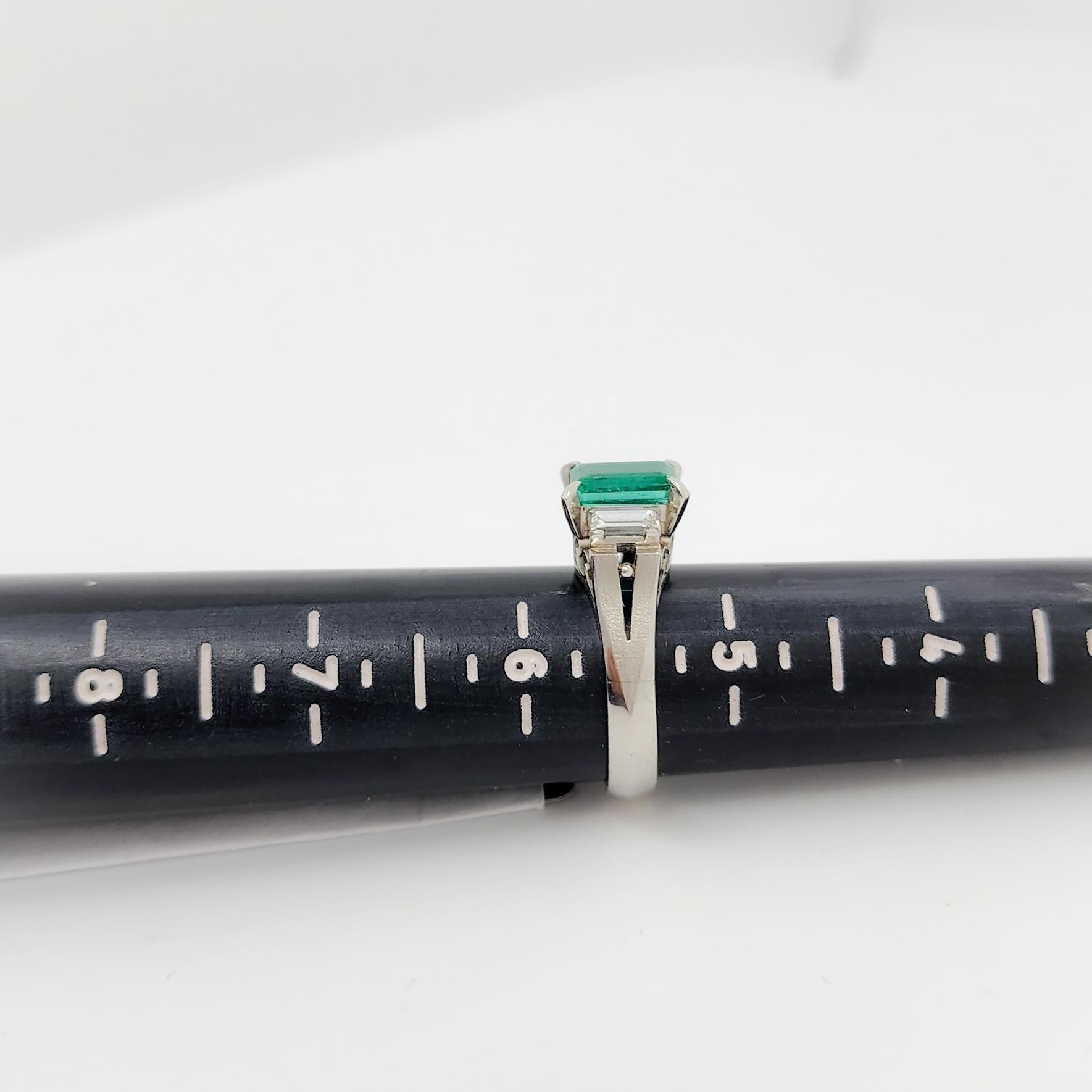 Emerald and White Diamond Three Stone Ring in Platinum 3