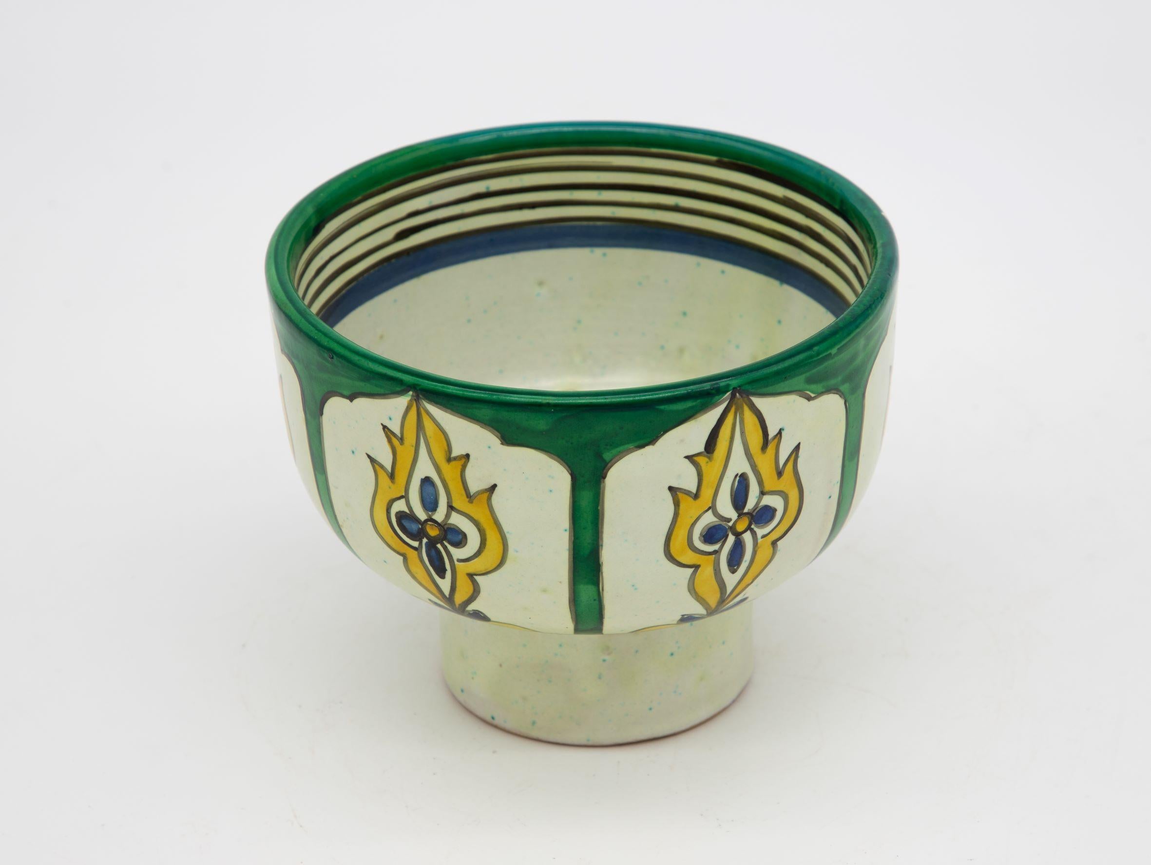 A beautiful handpainted Fes ceramic bowl brightly colored in green, saffron, and blue. This Moroccan Zlafa , Harira pot polychromic ceramic is from Fes , Morocco and was made at the end of the 19th century. Wear consistent with age and use.