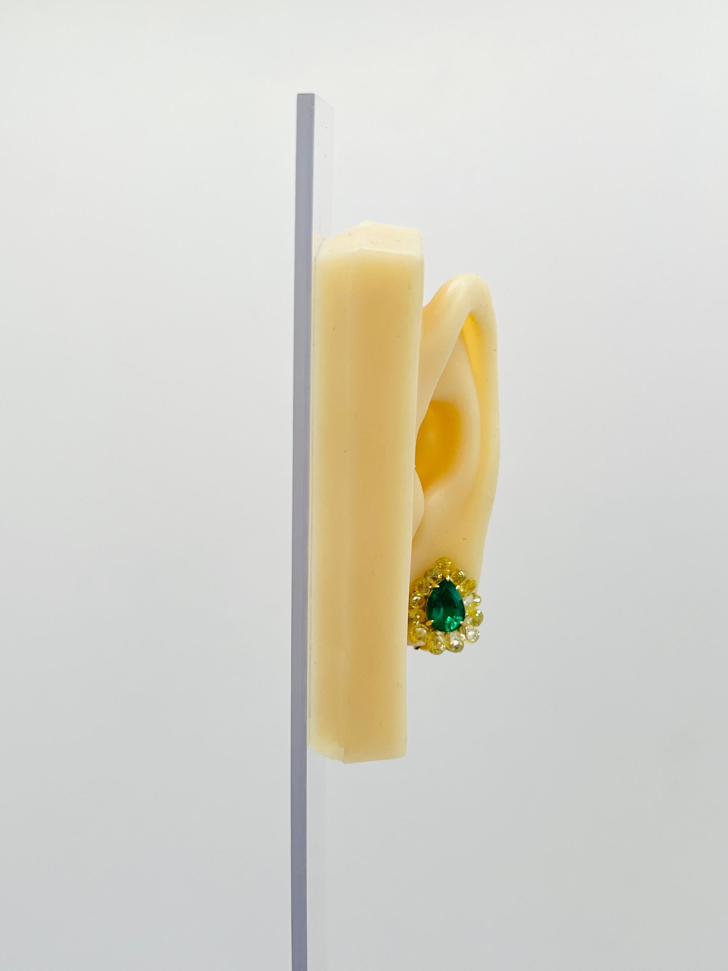Gorgeous big emerald pear shapes with natural yellow diamond briolettes.  Handmade in 18k yellow gold.  