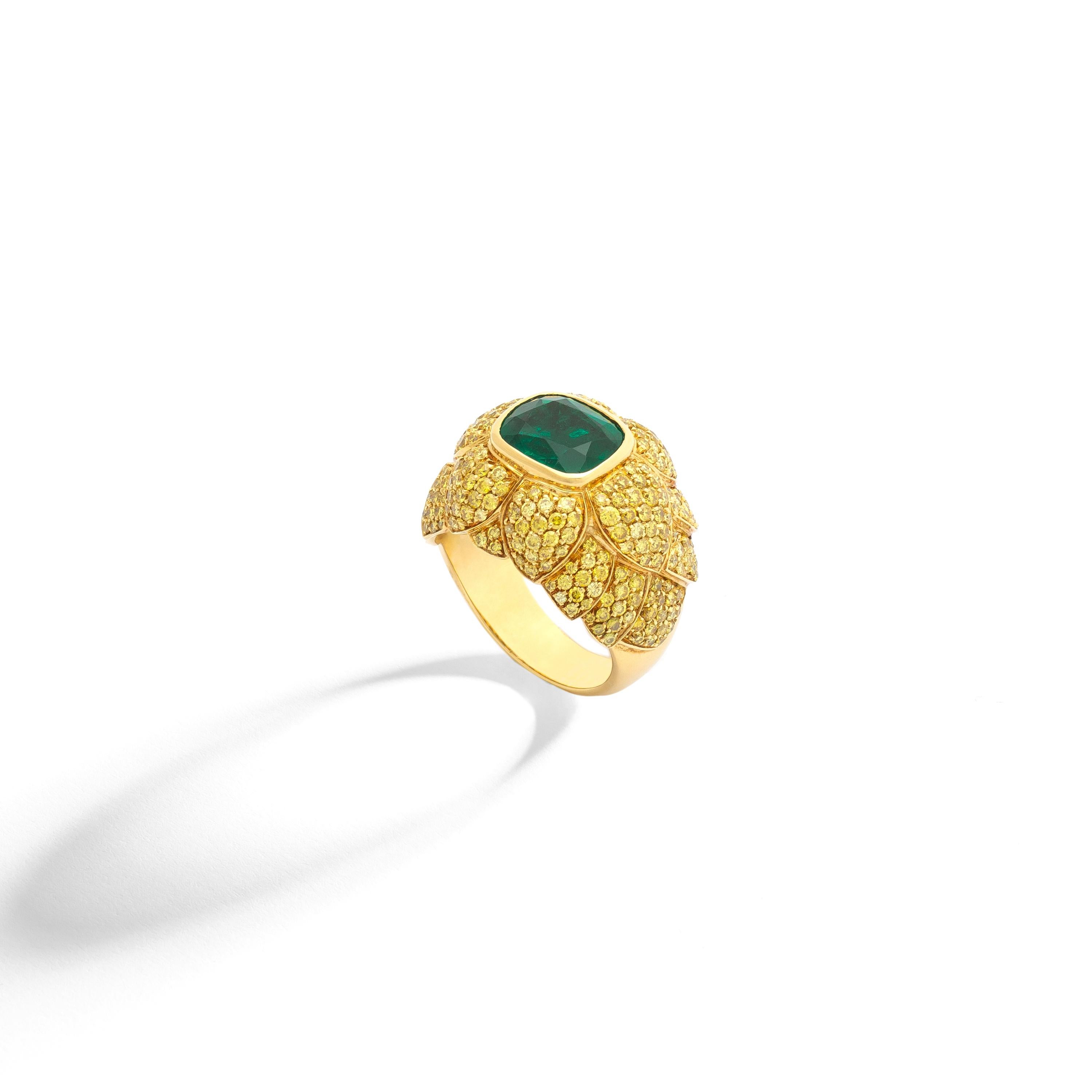 Yellow gold 18k Ring set by yellow Diamonds 1.91 carats and centered by a 2.47 carats Emerald.

