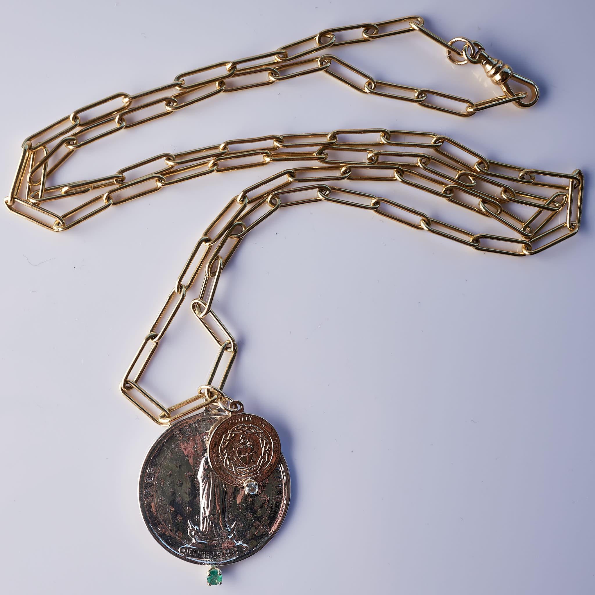 Emerald and Aquamarine Set in Gold Prongs on a Silver and Bronze Medal, One Medal is in Silver and is a French Saint, the other medal is a sacred heart in bronze with aquamarine. The Chunky Chain is a Gold Filled Necklace 28