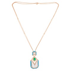 Collana con ciondolo di smeraldo e turchese dell'Arizona SI/H Diamond in oro giallo 14 carati