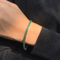 Armband im Art-Déco-Stil mit Smaragden im Kanalfassung-Design der „Eternity Line“ aus 18 Karat Weißgold