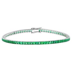 Armband im Art-Déco-Stil mit Smaragden im Kanalfassung-Design der „Eternity Line“ aus 18 Karat Weißgold