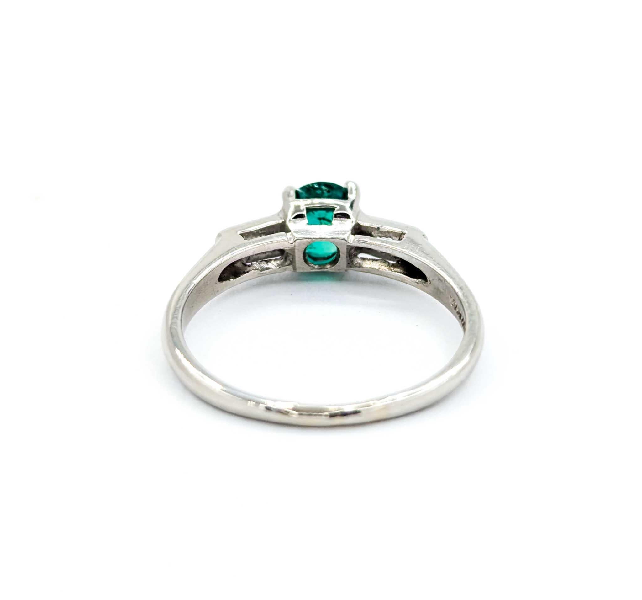 Baguette Cut Emerald & Baguette Diamonds Ring in Platinum For Sale