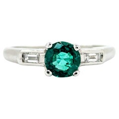 Anillo de Esmeralda y Diamantes Baguette en Platino
