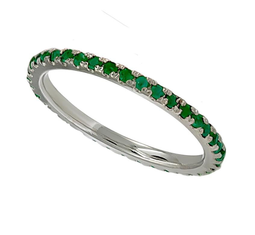 A dainty emerald band that contains approximately 0.90 carats of emeralds. This chic ring can be worn single or stacked with the same or multiple colors for a fun accessory! The material of this ring is 18K gold.